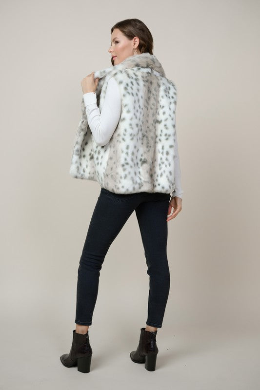 Leopard Faux Fur Vest skies are blue